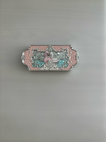 A closed eyeshadow palette.